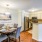 Large well lit dining area with wood floors