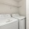 Large laundry area with washer and dryer