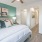 Bedroom with natural lighting and high ceilings
