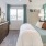 Bedroom with natural lighting and high ceilings